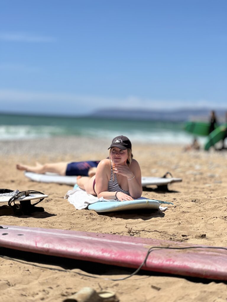 Chilling with a surfboard in Tamraght Morocco