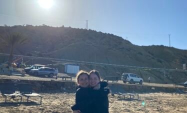 Two surfers at 25 km beach in Tamraght Morocco