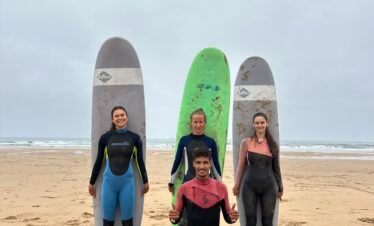 Our surf instructor with two surfers in Tamraght Morocco