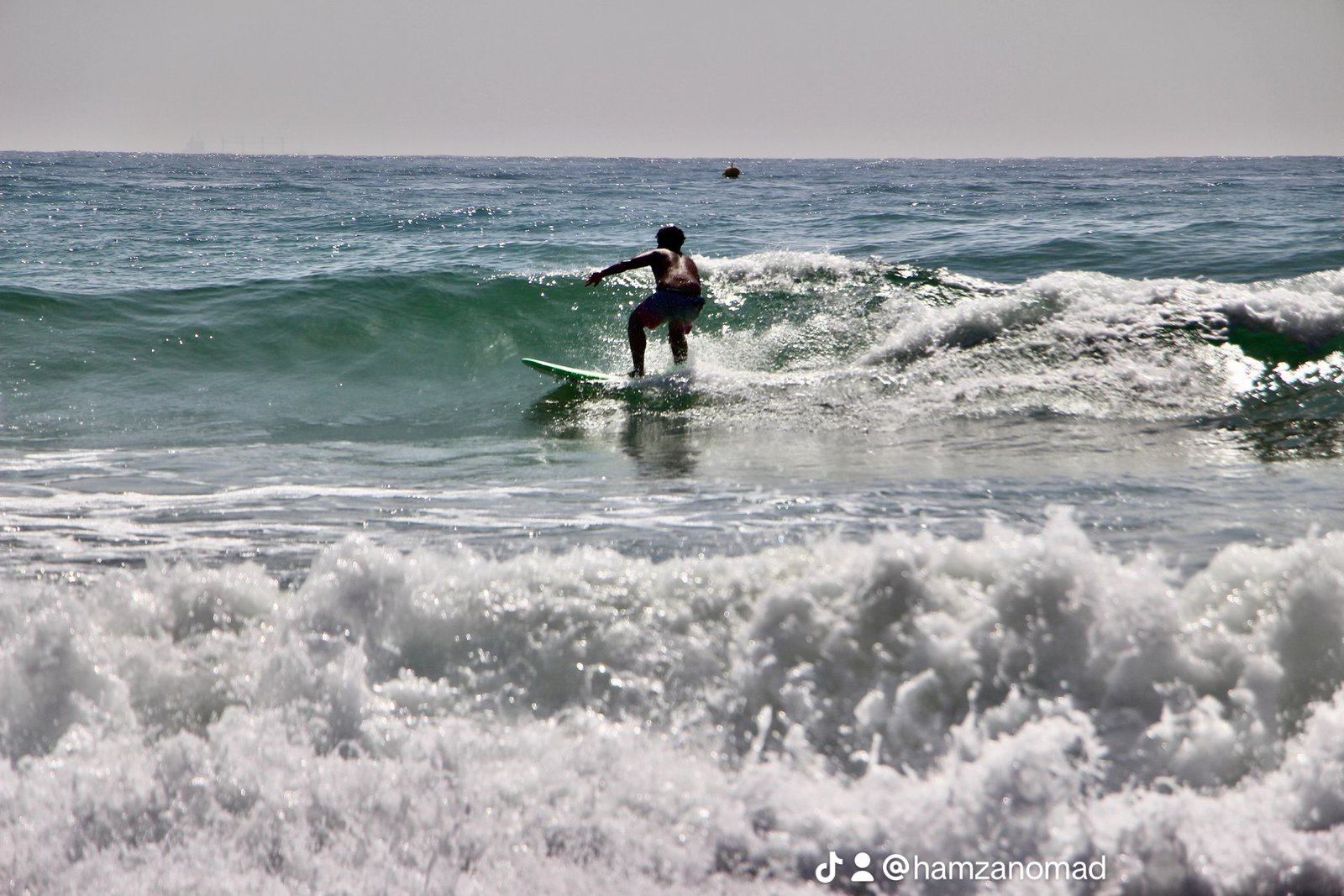 Our surfer catching a wave in Tamraght Morocco