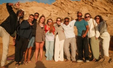 Our clients relaxing on the terrace with our staff in Timlaline Morocco