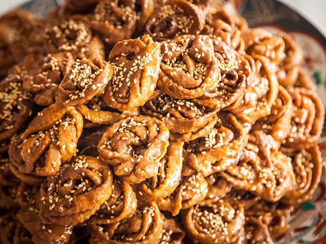 Chebakia cookies drizzled with honey, perfect for Ramadan dessert