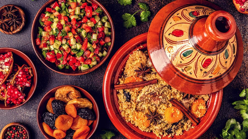 Traditional moroccan tajine of chicken with dried fruits and spices