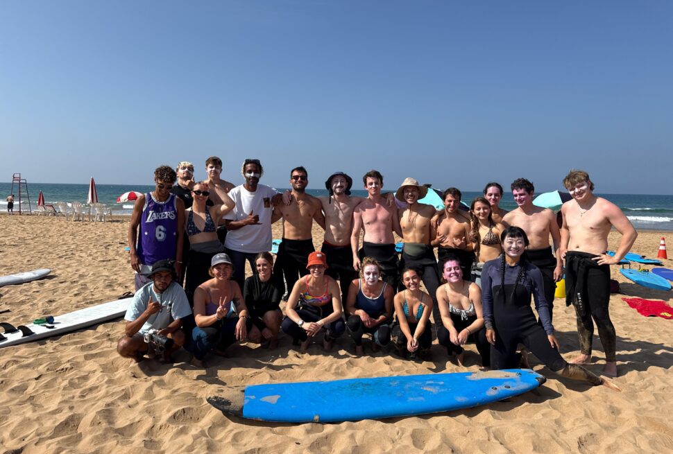 Group of beginners enjoying surf camp Tamraght Morocco experience