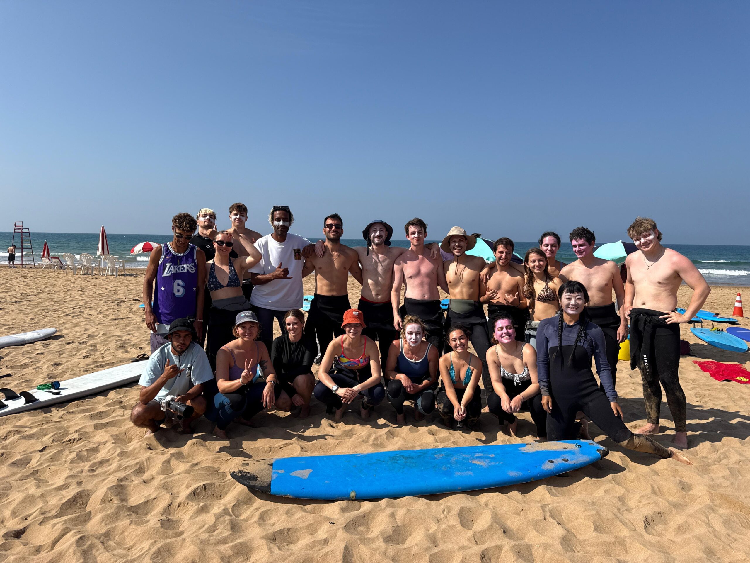 Group of beginners enjoying surf camp Tamraght Morocco experience