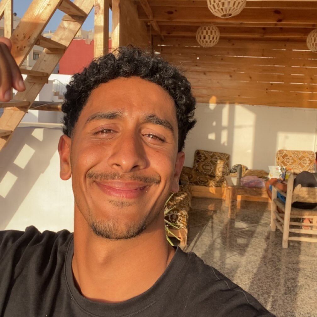 Anouar, surf instructor at PaddleOut Morocco surf camp in Tamraght